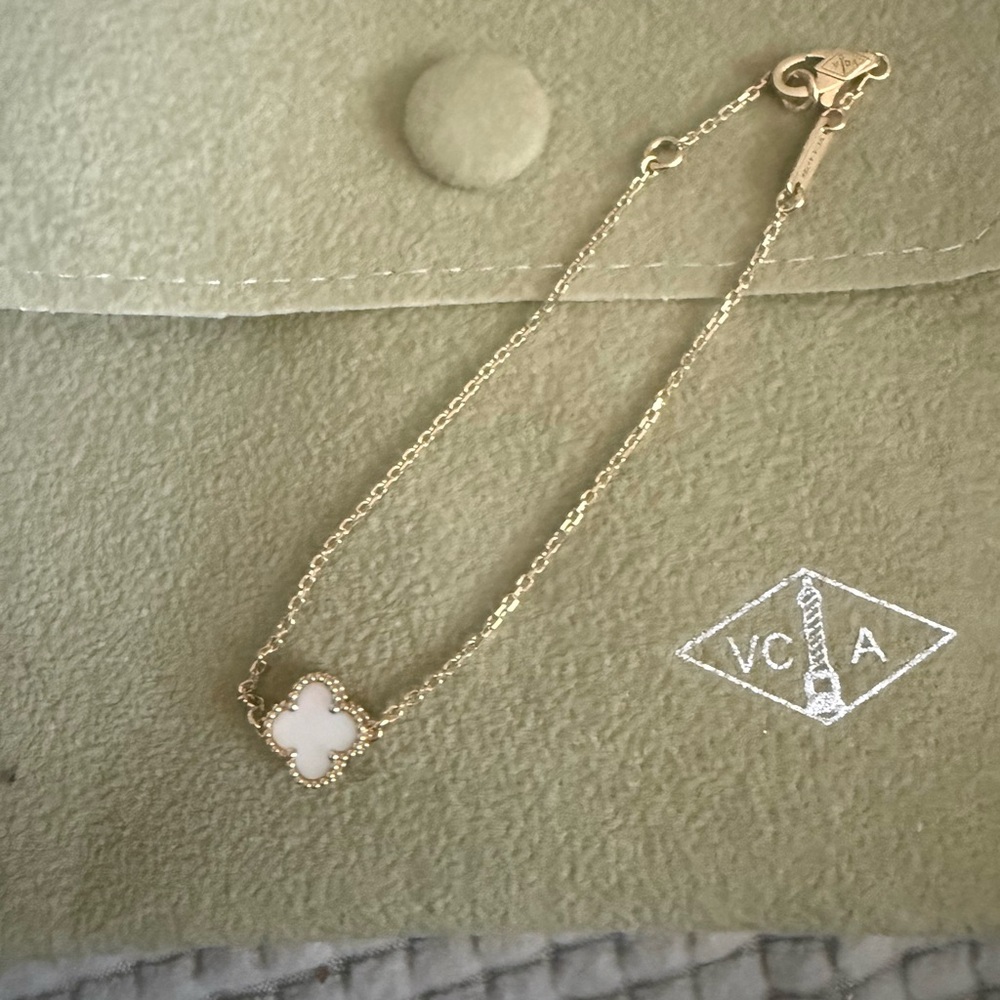 Van Cleef & Arpels Gold Bracelet with White Clover Charm